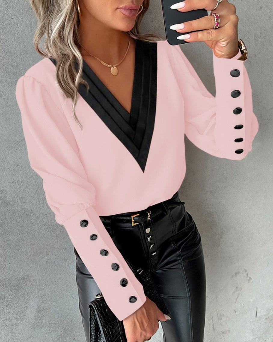 Fashionable V-neck blouse with long sleeves and button details