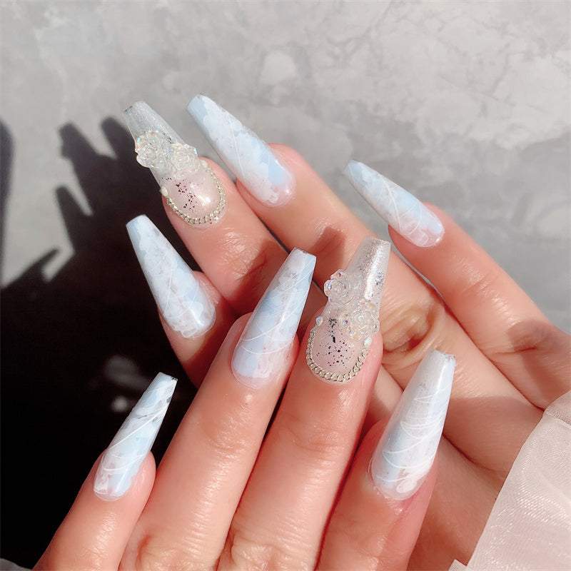 Premium wearable nails in soft macchiato and blue ice