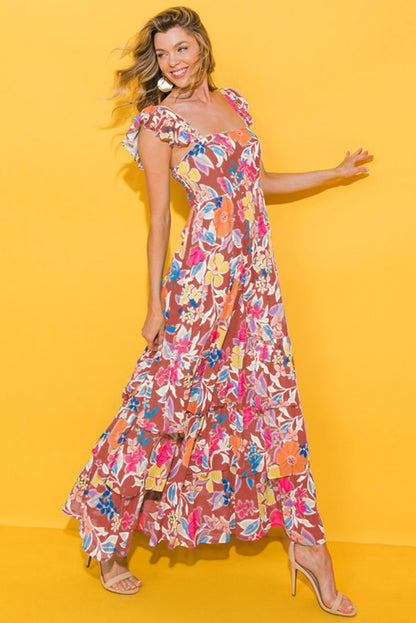 Roze mouwloze maxi-jurk met bloemenprint en ruches