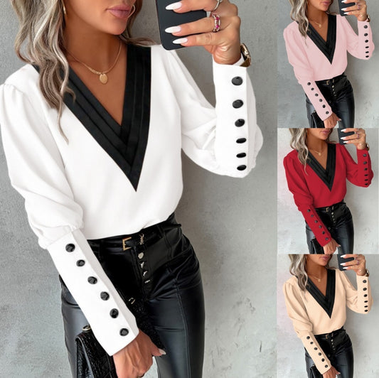 Fashionable V-neck blouse with long sleeves and button details