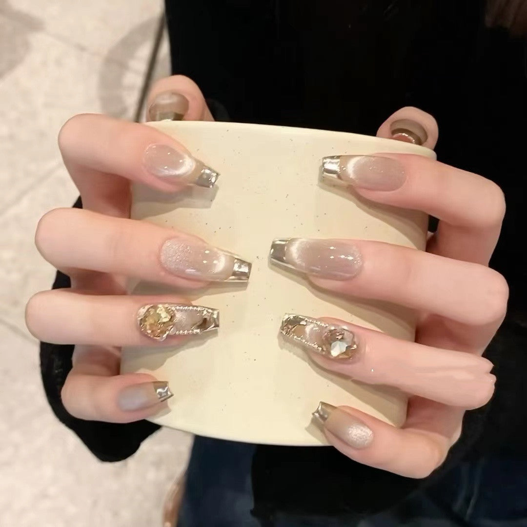 Temperament cat eye champagne manicure nails