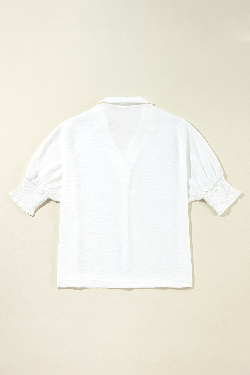 Witte boxy blouse met kraag en gesmokte mouwboorden