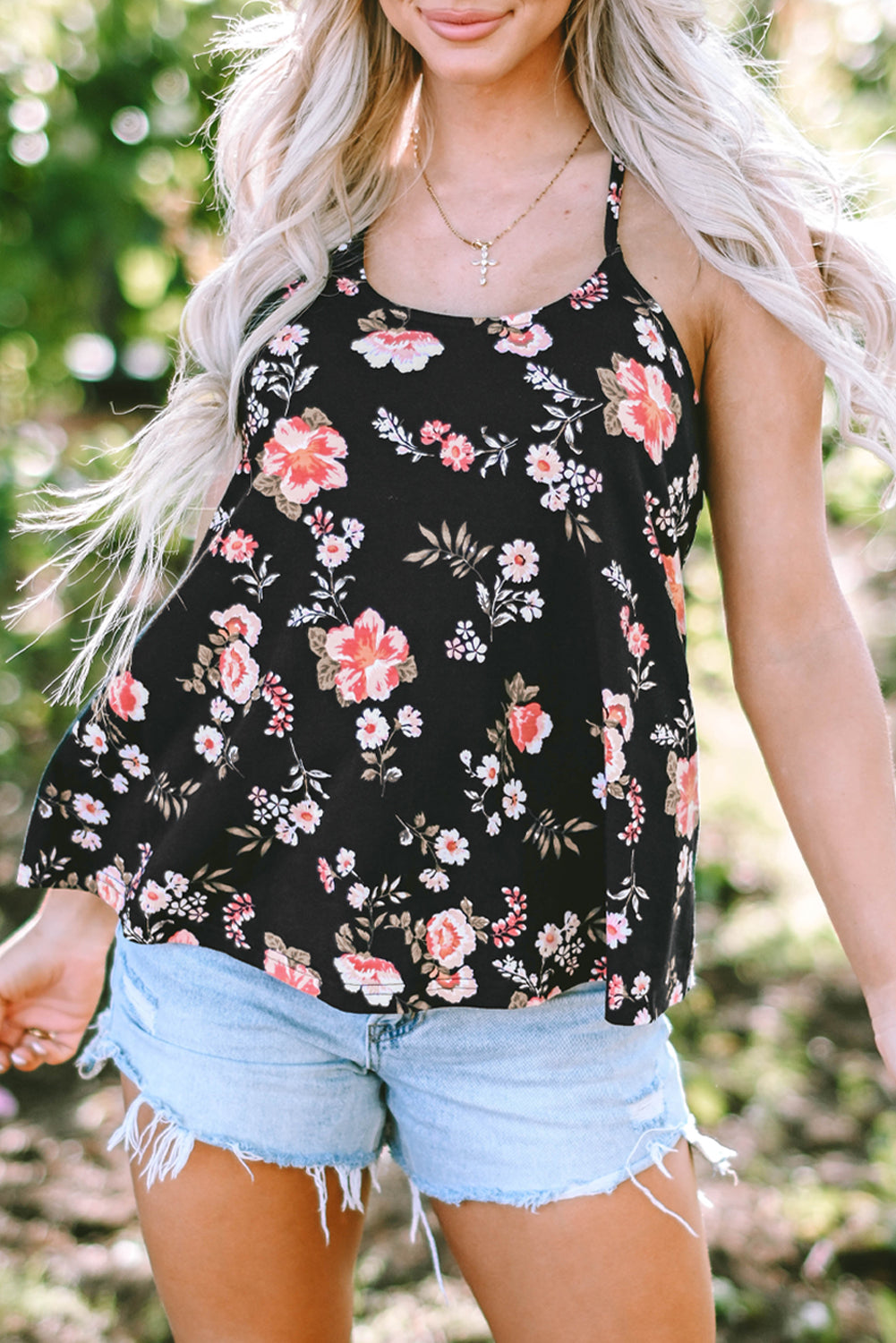 Beige tanktop met bloemenprint en kruislings straps-detail