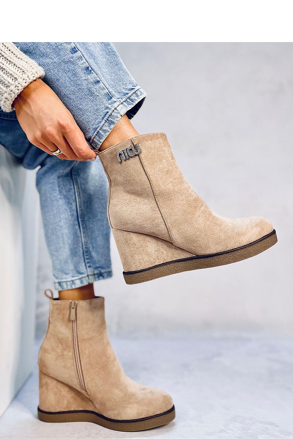 Boots on wedge heel model 188746 Inello