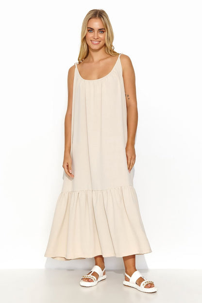 Solara GlowRuffle Maxi Dress - luchtige zomerjurk met geknoopte bandjes en brede volant in diverse kleuren.