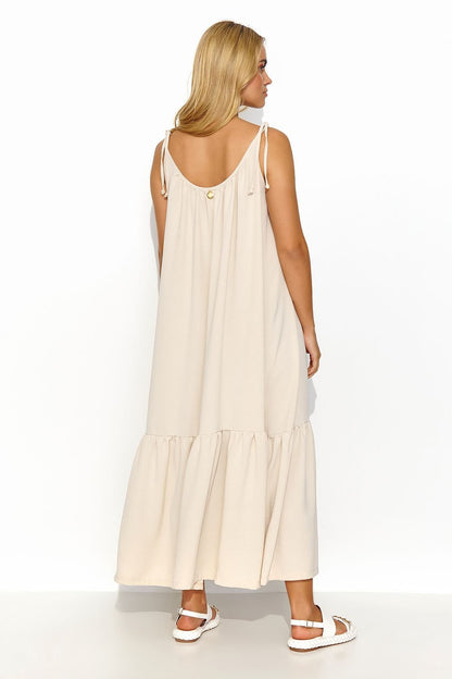 Solara GlowRuffle Maxi Dress - luchtige zomerjurk met geknoopte bandjes en brede volant in diverse kleuren.