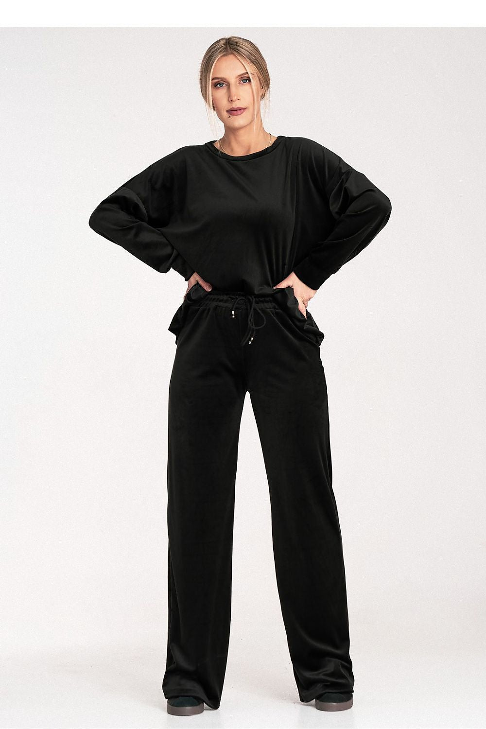 Nerina - Broek in polyester mix met stretch, elastische taille en wijde pijp.