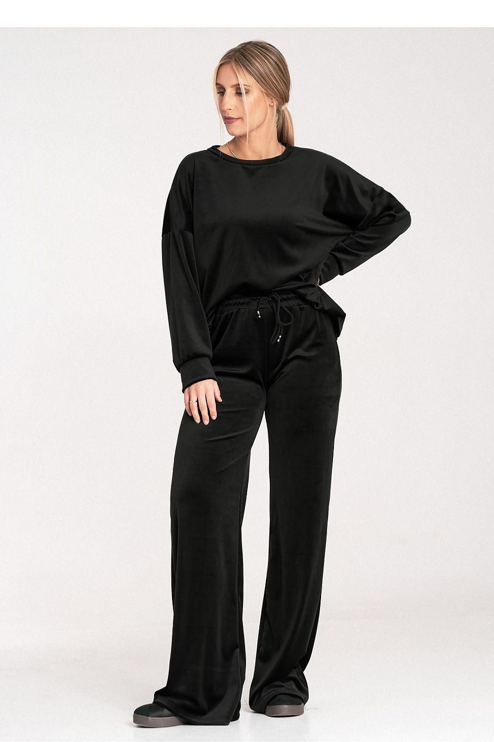 Nerina - Broek in polyester mix met stretch, elastische taille en wijde pijp.