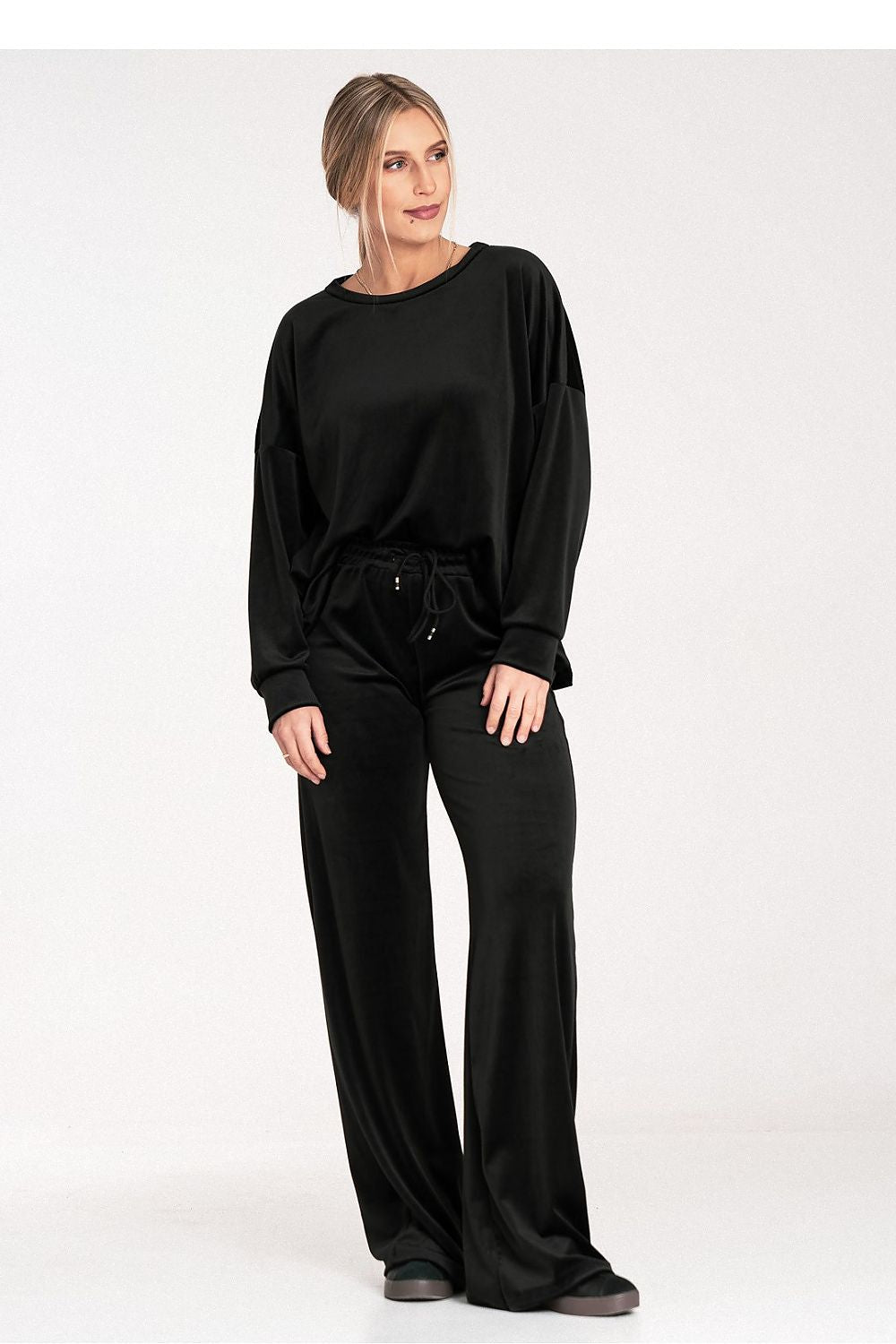 Nerina - Broek in polyester mix met stretch, elastische taille en wijde pijp.